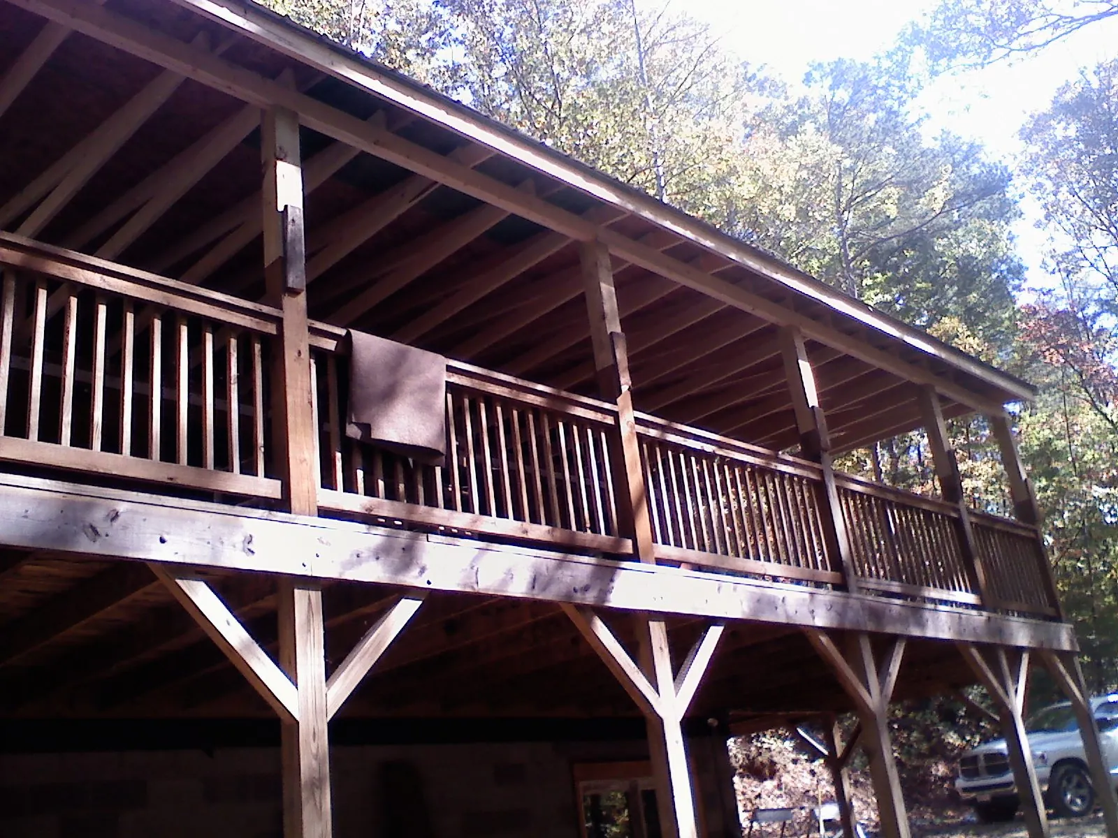 Timber framing under a new elevated porch and deck in East Greenville